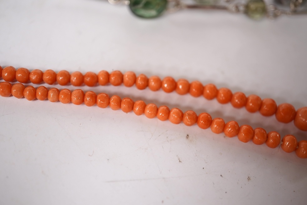 A small quantity of assorted mainly costume jewellery including a pair of malachite earrings and a graduated coral bead necklace, together with an Omega watch box and a gentleman's Quamer quartz wrist watch. Condition -
